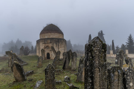 Mausoleum and tombstones at an old cemetery in Azerbaijan.の写真素材