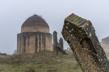 Mausoleum and tombstones at an old cemetery in Azerbaijan.の写真素材