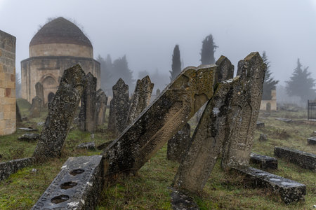 Mausoleum and tombstones at an old cemetery in Azerbaijan.の写真素材