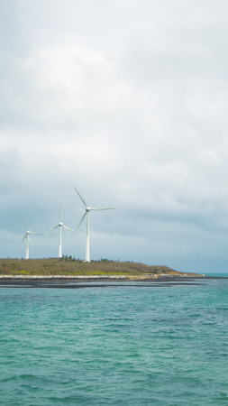 Windmill by the seaの写真素材