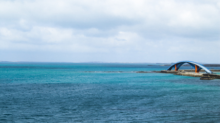 arch bridge over the seaの写真素材