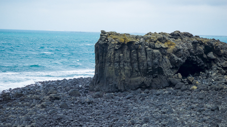Huge stone by the seaの写真素材