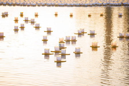 Water lanterns under the setting sunの写真素材