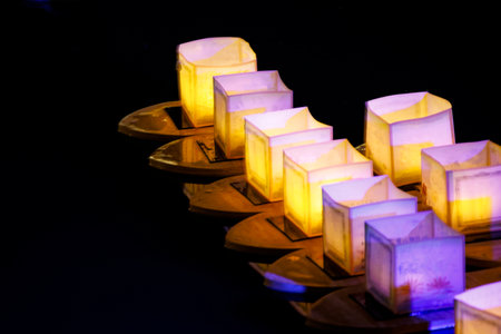 water lanterns float on the calm lakeの写真素材