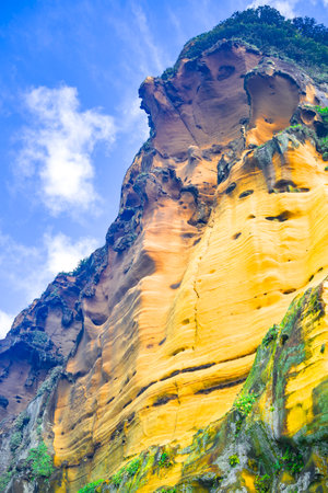 a spectacular natural monolith by the seasideの写真素材