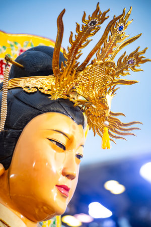 close-up of the elaborate and magnificent crown atop a goddess's headの写真素材