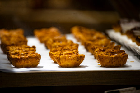 several neatly arranged Portuguese egg tarts
