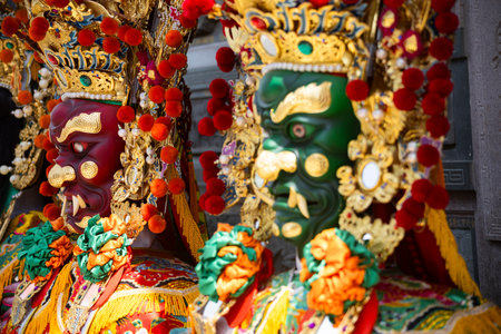 the ornate statue of General Shun Feng Er (Patron of Good Hearing)の写真素材