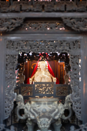 lose-up of the Mazu (also known as the Heavenly Holy Mother) statueの写真素材