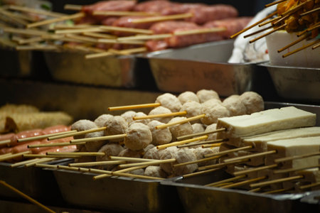 the sight of a rich ingredient display at an Asian street barbecue stall (often found in night markets)の写真素材