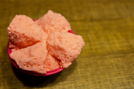 the delicate texture and cultural depth of the Pink Prosperity Cake (Fa Gao)