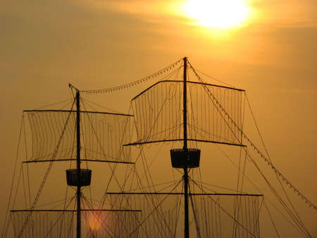 gold sunset over boat mast river sava belgrade.の写真素材