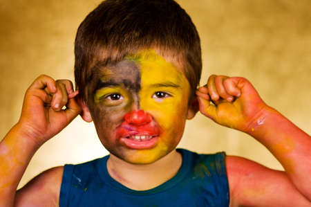 little boy and a cheerful make-upの写真素材