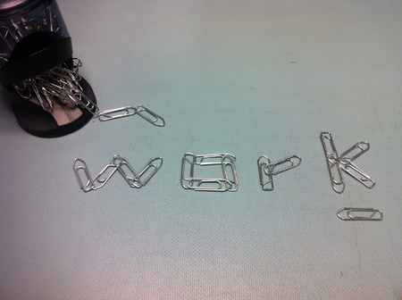 paper clips spelling out "work"の素材