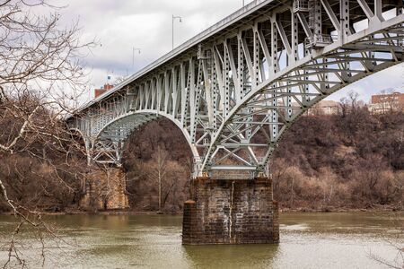 Bridge over a river in winter.の写真素材