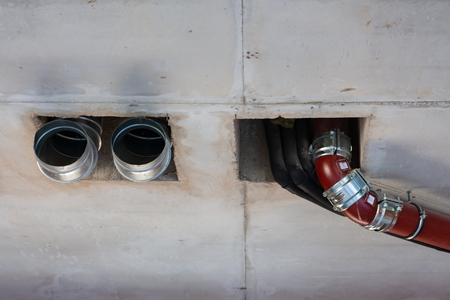 pipes of sewage, ventilation, water supply in the created interiorの写真素材