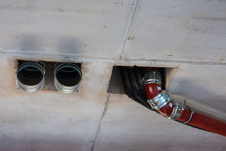 pipes of sewage, ventilation, water supply in the created interiorの写真素材