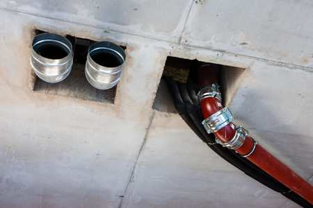 pipes of sewage, ventilation, water supply in the created interiorの写真素材