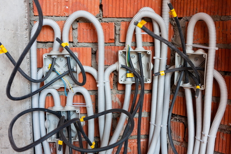 Soldered junction boxes with wires hidden in the corrugation. Realisticの写真素材