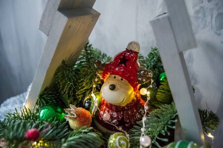 Christmas composition of fir branches with Christmas decorations and garlands.の写真素材