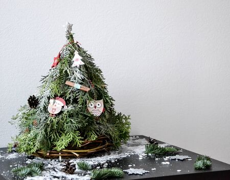 Christmas composition from thuja with Christmas balls and other decorations.の写真素材