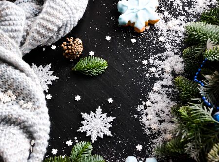 Christmas background with snowflake decorations and a scarf.の写真素材