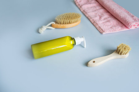 Massage brush for the body. Dry lymphatic drainage massage. Wooden brush made of cactus and boar fiber. Homemade body care.の写真素材