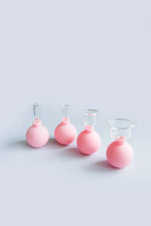 Vacuum cups of different sizes for lymphatic drainage facial massageの写真素材
