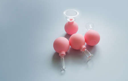 Vacuum cups of different sizes for lymphatic drainage facial massageの写真素材