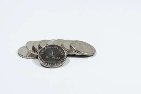 a close up view of United Arab Emirates coin with white background, fils, UAE currency, UAE coins,...