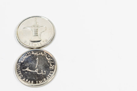 a close up view of United Arab Emirates coin with white background, fils, UAE currency, UAE coins, filsの写真素材