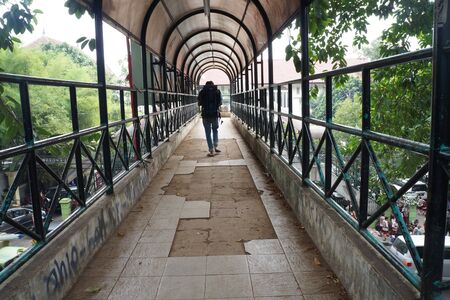 bridge crossing the roadの写真素材