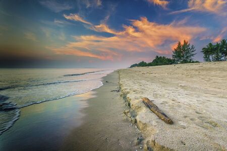 the beautiful panoramic view of the beach during sunriseの写真素材