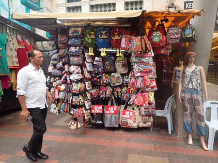 Kuala Lumpur, Malaysia. April 5 2018. Man walk pass the stall at Central Market Kasturi Walk in Kuala Lumpur, Malaysia.のeditorial素材