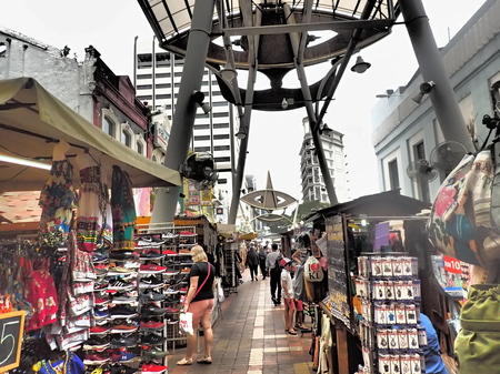 Kuala Lumpur, Malaysia. April 5 2018. Stalls and people at the semi covered pedestrianized street of Central Market Kasturi Walk in Kuala Lumpur, Malaysia.のeditorial素材