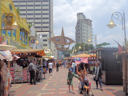 Kuala Lumpur, Malaysia. April 5 2018. People walks pass the stalls at pedestrianized street of Central Market Kasturi Walk in Kuala Lumpur, Malaysia.のeditorial素材