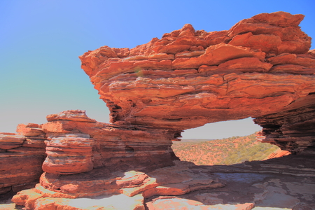 The Nature Window, a wind-eroded opening in the layered sandstone at Kalbarri National Park, Australia.の写真素材