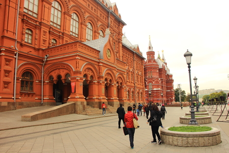 Moscow, Russia. October 10 2015. The impressive Russian Gothic red brick building of the former Moscow City Hall with people walking at the front of it.のeditorial素材