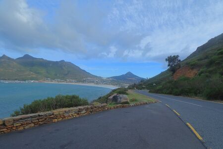 Chapman's Peak Drive or M6 Road, a scenic coastal road with the of Hout Bay in Cape Peninsula, South Africa.の写真素材