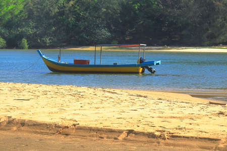 A boat mooring at the bank of Sungai Merang River in Setiu District of Terengganu, Malaysia.の写真素材