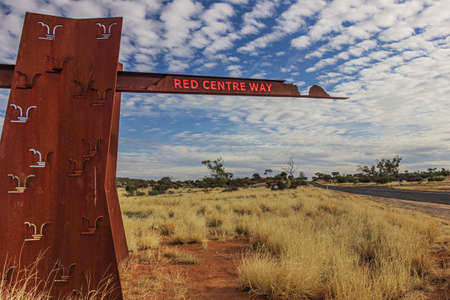 The Red Centre Way road sign at the Natmatjira Drive road in Northern Territory, Australiaの写真素材