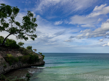 A stunning view of the beach at Bukit Lamreh, Aceh Besar, surrounded by clean, soft white sand. The...