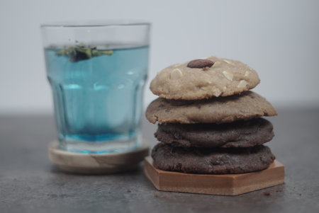 Stacking cookies with blue tea or butterfly pea tea