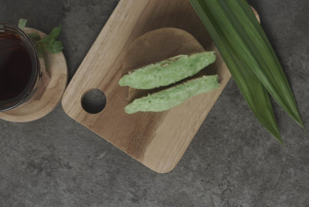 Kue Pukis is a traditional Indonesian snack.Made with a simple batter of eggs, sugar, and flour.The golden-brown top of the Kue Pukis is a perfect contrast to the white and fluffy texture of the cake.の写真素材