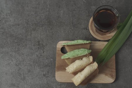 Kue Pukis are traditional Indonesian cakes. Made with a simple batter of eggs, sugar, and flour, these round treats are a sweet addition to any snack time. Enjoy with a cup of tea or coffee.の写真素材