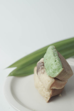 Kue Pukis with an isolated white background. These traditional Indonesian snacks are made with a combination of rice flour, coconut and brown sugar.の写真素材