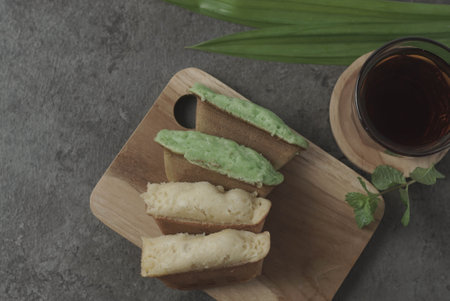 Kue Pukis are traditional Indonesian cakes. Made with a simple batter of eggs, sugar, and flour, these round treats are a sweet addition to any snack time. Enjoy with a cup of tea or coffee.の写真素材