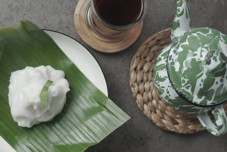 A traditional Indonesian dish, Bubur Merah Putih is made with boiled red rice, coconut milk, and sugar. Served with tea, this comforting dessert is a surefire crowd-pleaser.の写真素材