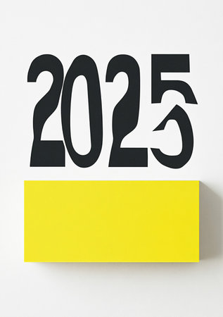 New year 2015 on a white wall with a yellow sheet of paperの素材