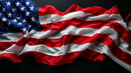A close-up shot of a waving American flag, symbolizing freedom, patriotism, and national pride. The flags vibrant colors and dynamic movement evoke a sense of unity and strength.の素材